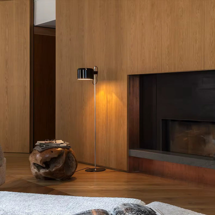 Lampe de sol noire, bras articulé, design contemporain, lumière d'appoint versatile.