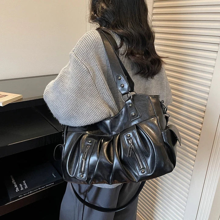 Sac Kéa en similicuir grainé, élégant et pratique, avec bandoulière ajustable pour femme.