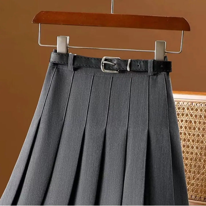 Jupe midi plissée pour femme, polyvalente et tendance, avec ceinture, parfaite pour toutes occasions.