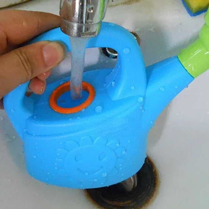 Arrosoir et pulvérisateur d'eau jouet pour enfant, parfait pour le jardin ou la plage en été.