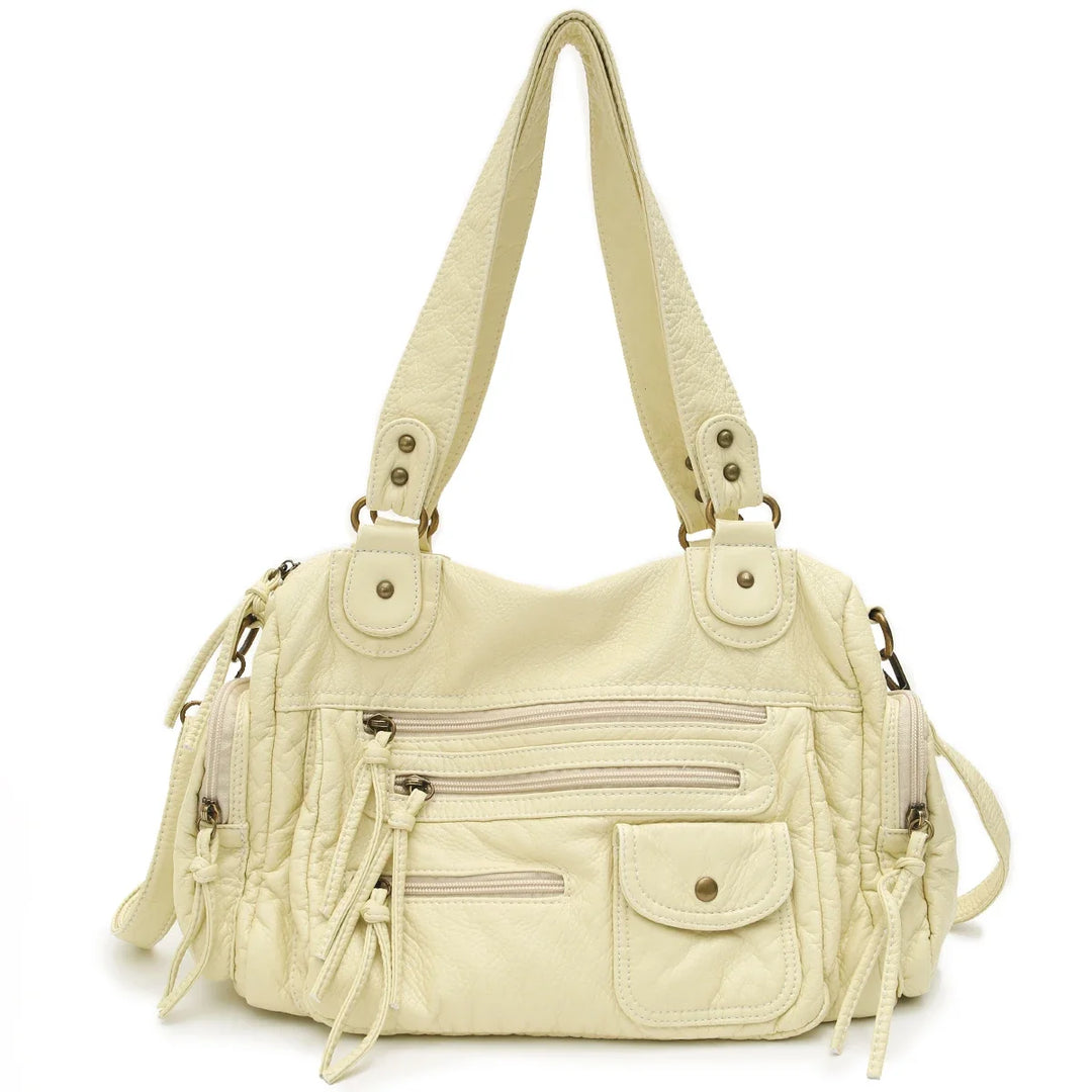 Sac femme cabas vintage élégant et spacieux en similicuir. Idéal pour un usage quotidien avec bandoulière.