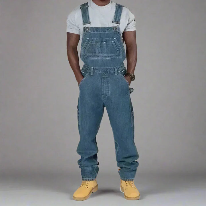 Overall en denim pour homme, offrant un confort ultime et un style moderne. Idéal pour le travail ou les loisirs.