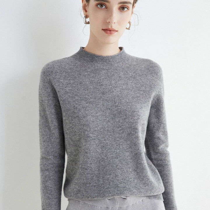 Pull PARIS femme en cachemire doux, col rond, un vêtement élégant pour une allure raffinée et décontractée.