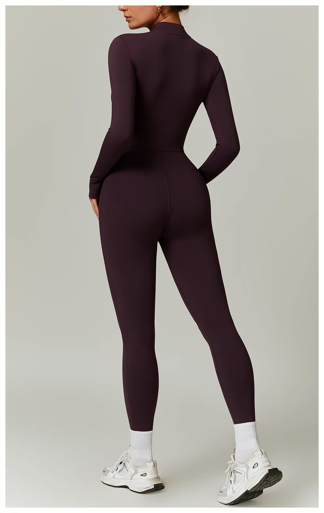 Combinaison femme chaude polaire hiver, col ajustable stretch. Idéale pour sport, détente et élégance.