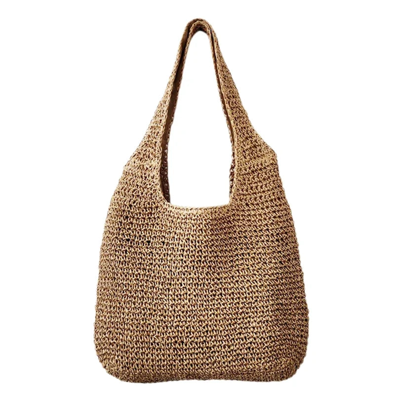 Sac de plage femme en paille, design naturel et léger, indispensable pour vos escapades estivales.