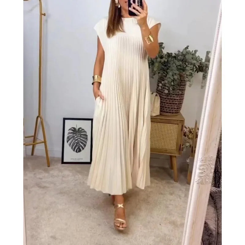 Vêtement femme : Robe plissée Tamara longue, confortable et polyvalente. Style chic pour printemps-été, soirée/jour.