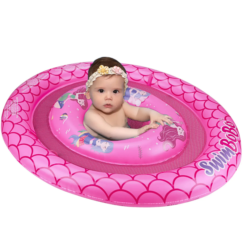 Bébé joyeux dans bouée gonflable avec pare-soleil amovible. Idéal pour la plage et protection solaire.