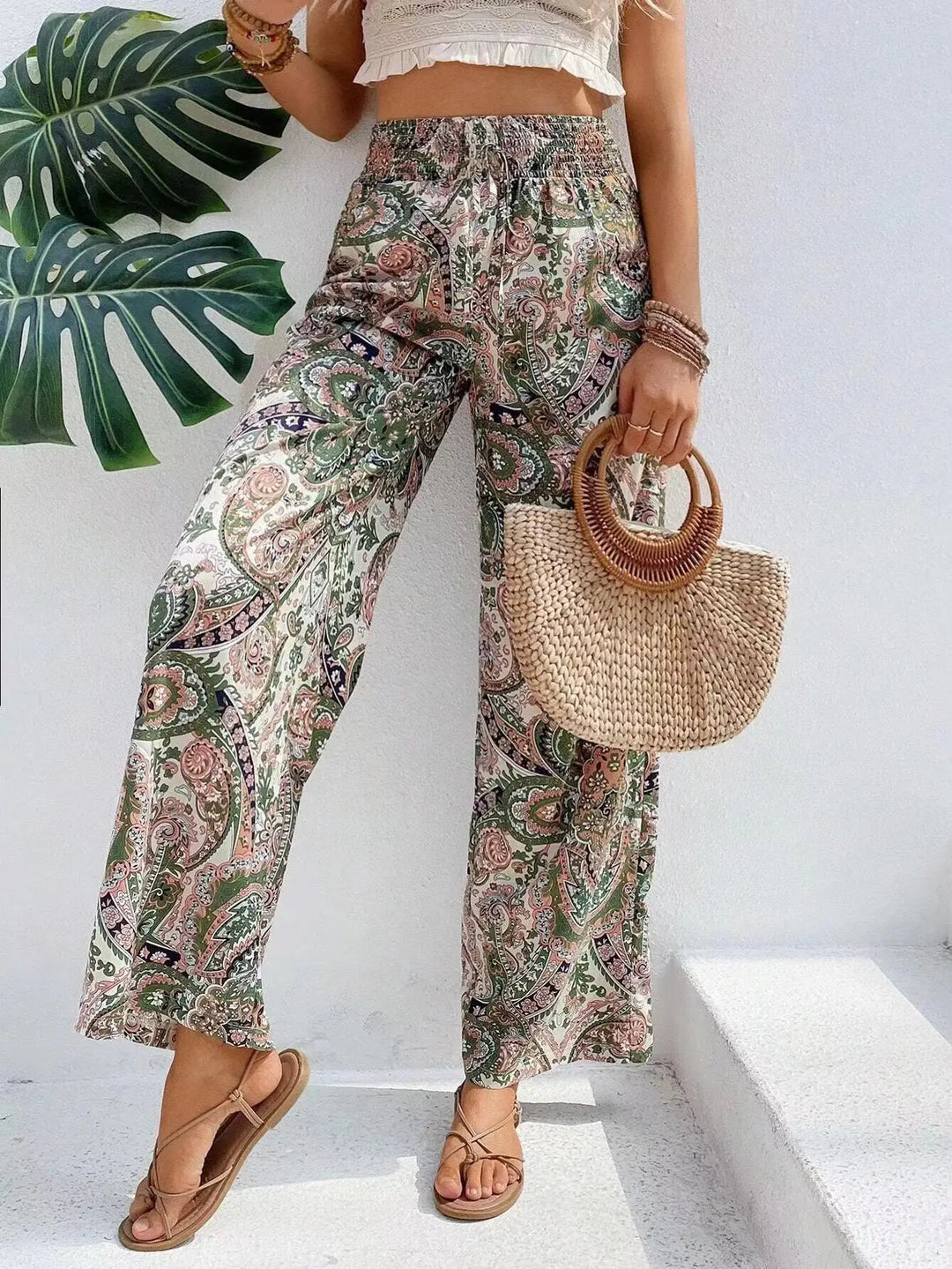 Pantalon femme confortable à imprimé vintage, coupe large et taille haute, idéal pour une mode printanière.