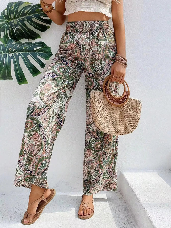 Pantalon femme confortable à imprimé vintage, coupe large et taille haute, idéal pour une mode printanière.