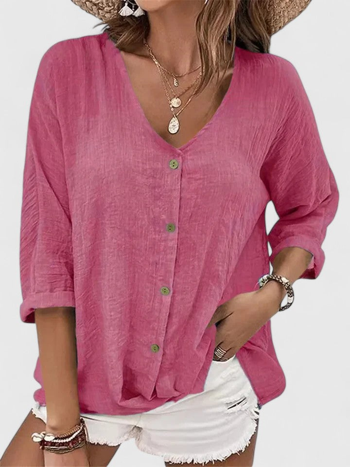 Blouse légère femme avec col V, style élégant et décontracté, parfaite pour l'été. Confort et mode printanière.