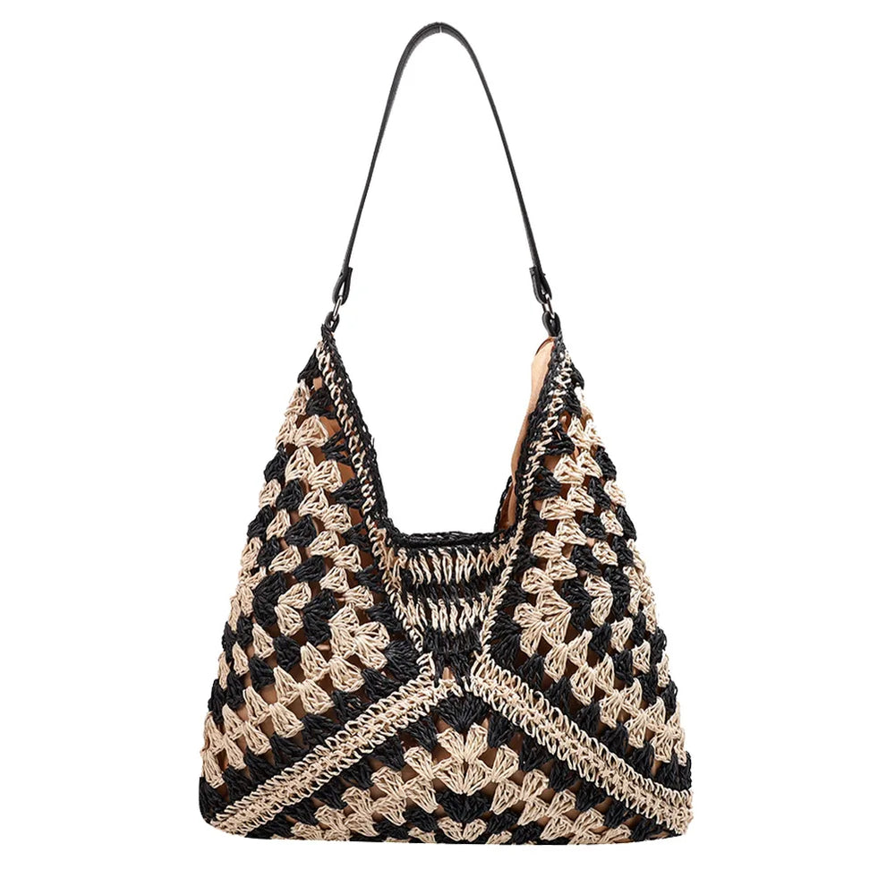 Grand sac de plage en paille naturelle pour femme, accessoire mode parfait pour les vacances d'été.
