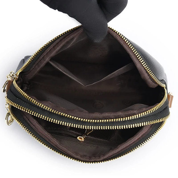 Sac à main femme en cuir vegan, chic et pratique avec plusieurs compartiments internes.