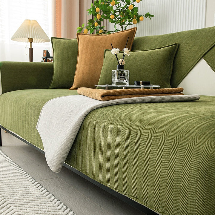 Relookez votre salon avec une housse de canapé moderne et extensible, apportant élégance et protection à votre intérieur.