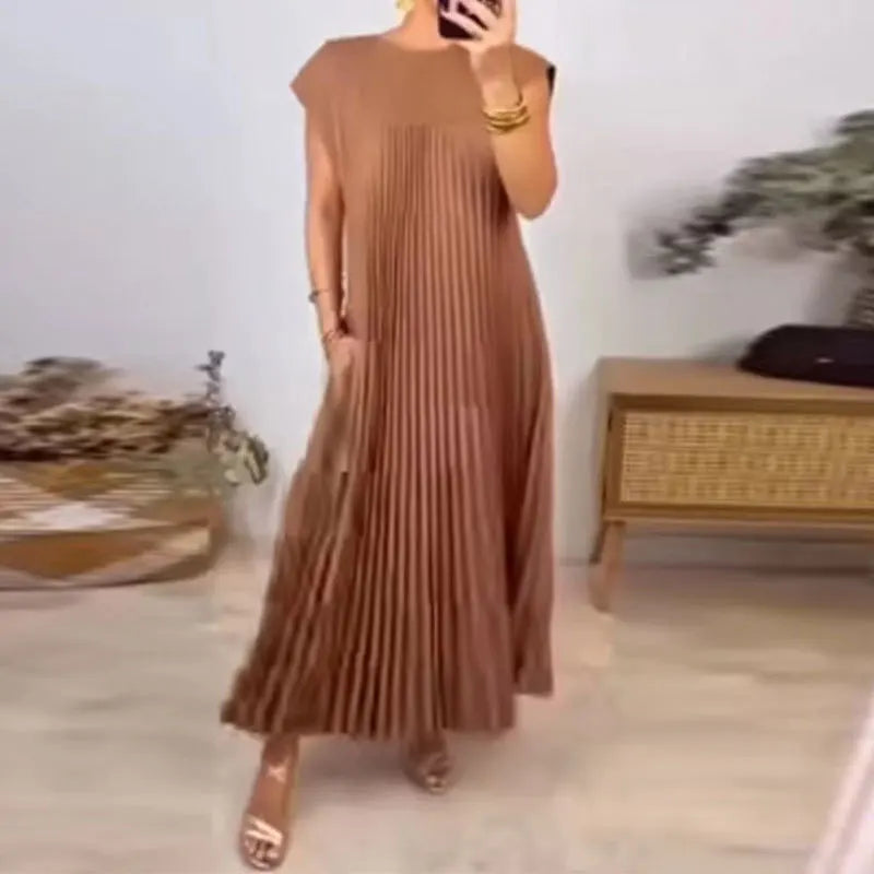 Robe femme chic plissée Tamara, élégante et confortable pour diverses occasions. Style polyvalent printemps-été.