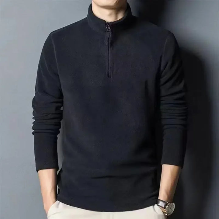 Pull polaire demi-zip chaud et polyvalent, parfait pour affronter le froid de l'automne et de l'hiver avec style.