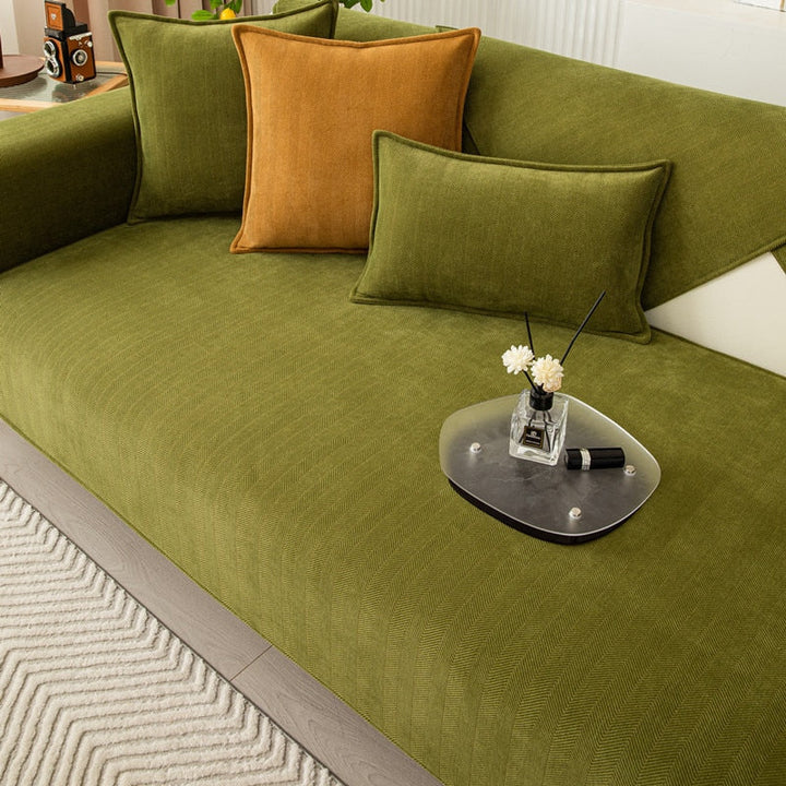 Housse de canapé textile, élastique et robuste, pour une protection durable de votre meuble et un style moderne.