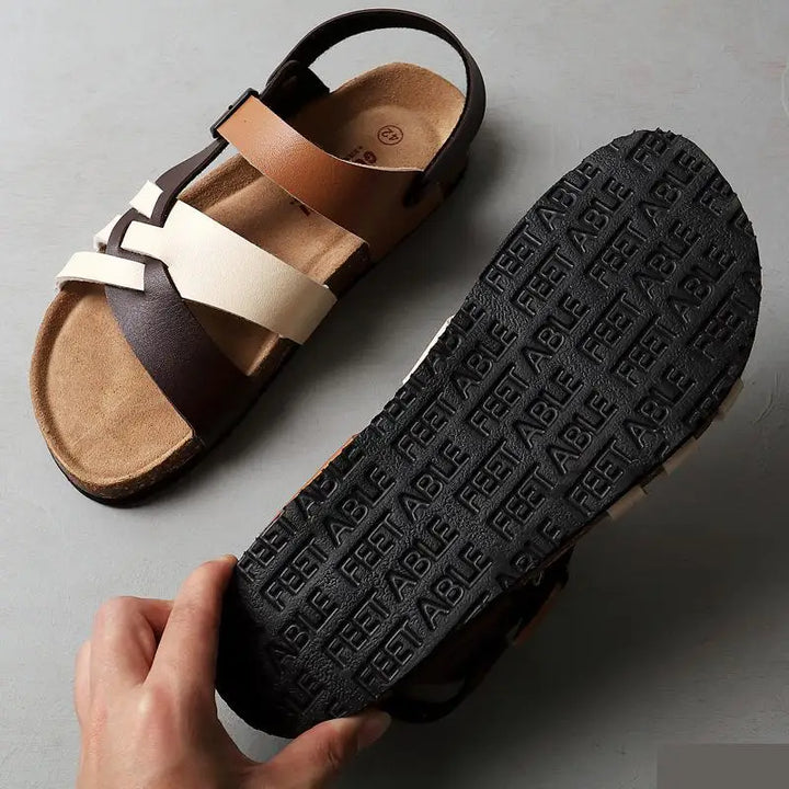 Sandales élégantes type gladiator pour femmes et hommes, offrant un confort orthopédique supérieur.