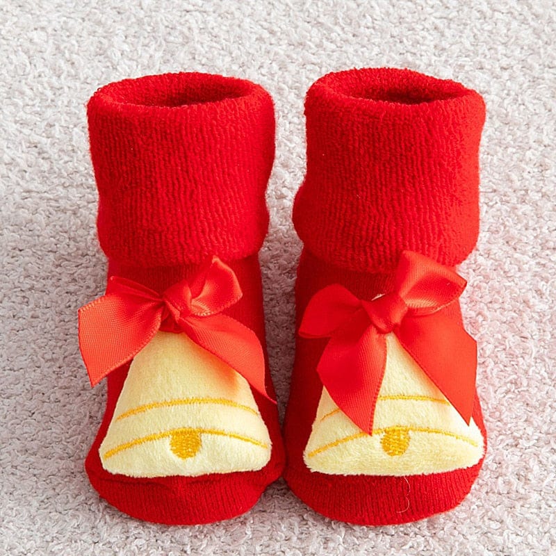 Chaussons bébé de Noël antidérapants pour la maison, confort et sécurité des tout-petits.