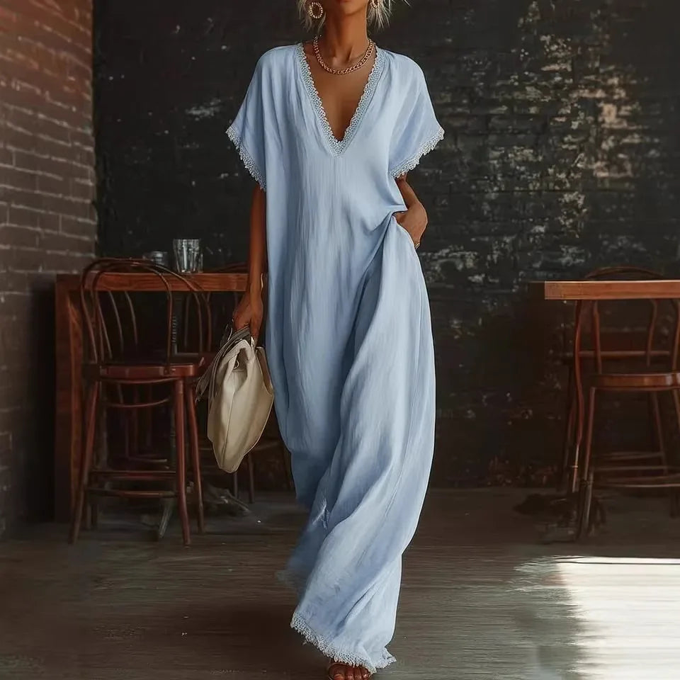 Robe longue fluide femme élégante, col V, dentelle délicate. Parfaite pour l'été et les soirées chic.