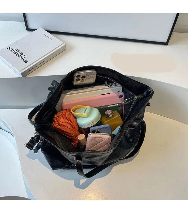 Sac cabas Inka quotidien pour femme active ou étudiante. Grand espace de rangement, bandoulière confortable.