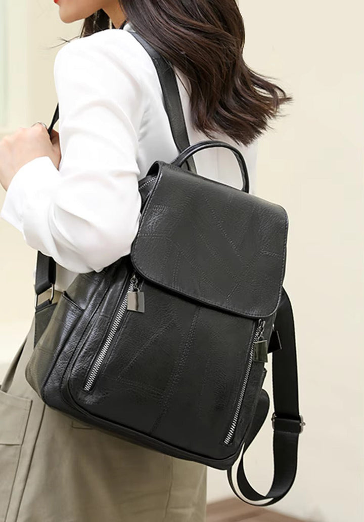 Sac à dos noir femme antivol, accessoire polyvalent et sécurisé pour vos déplacements quotidiens. Design moderne.