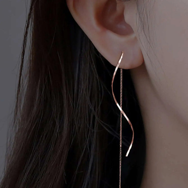 Boucles d'oreilles vagues longues pendantes pour femmes, élégantes et modernes, en argent.