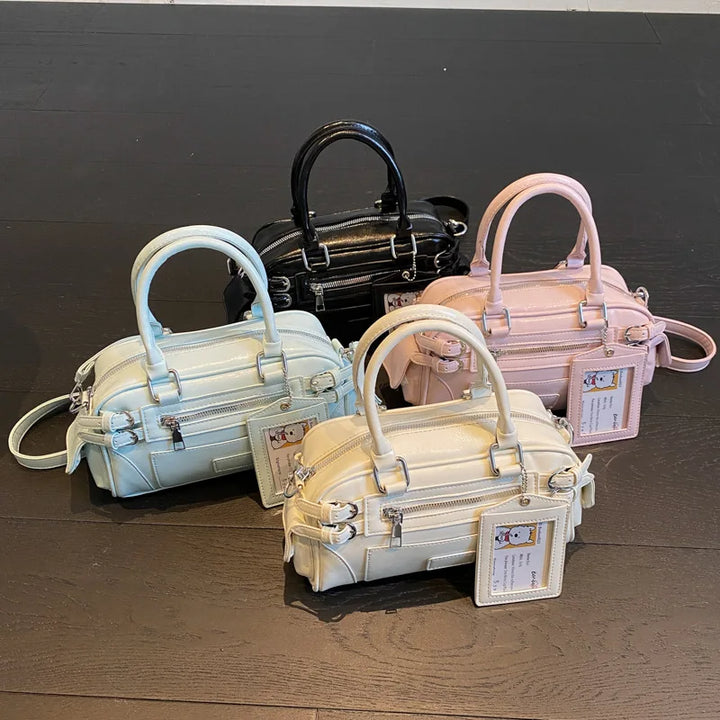 Sac à main femme Alméa bleu en similicuir, design contemporain pour une élégance discrète et pratique.