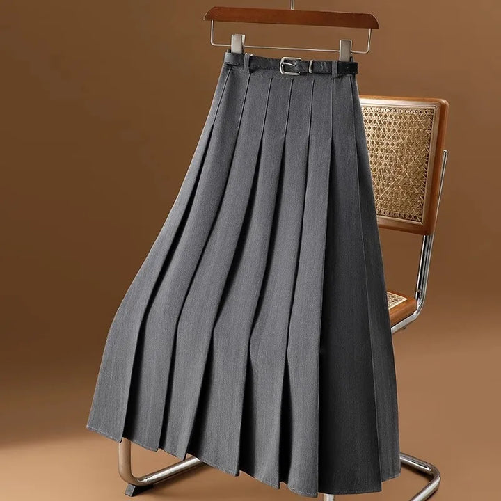 Jupe plissée midi femme élégante, couleur unie, idéale pour look chic automne/printemps.
