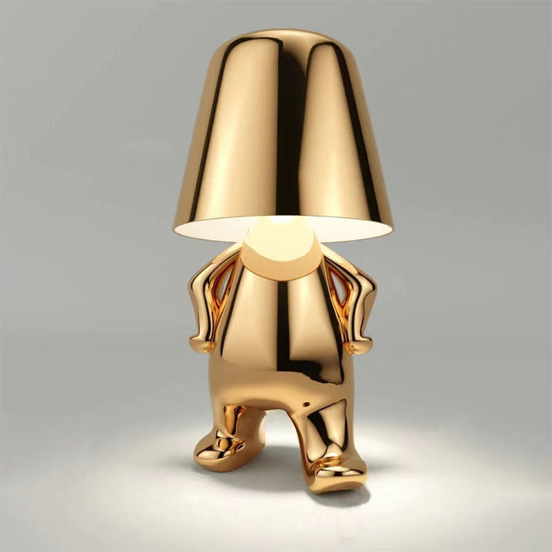 Lampe de table LED design art moderne, ornement homme stylisé, lumière d'ambiance chic pour intérieur.
