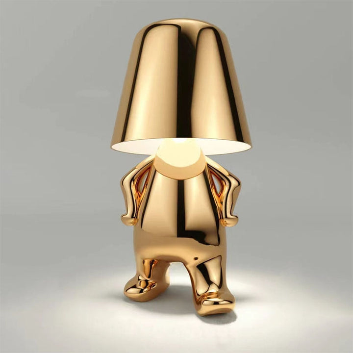 Lampe de table LED design art moderne, ornement homme stylisé, lumière d'ambiance chic pour intérieur.