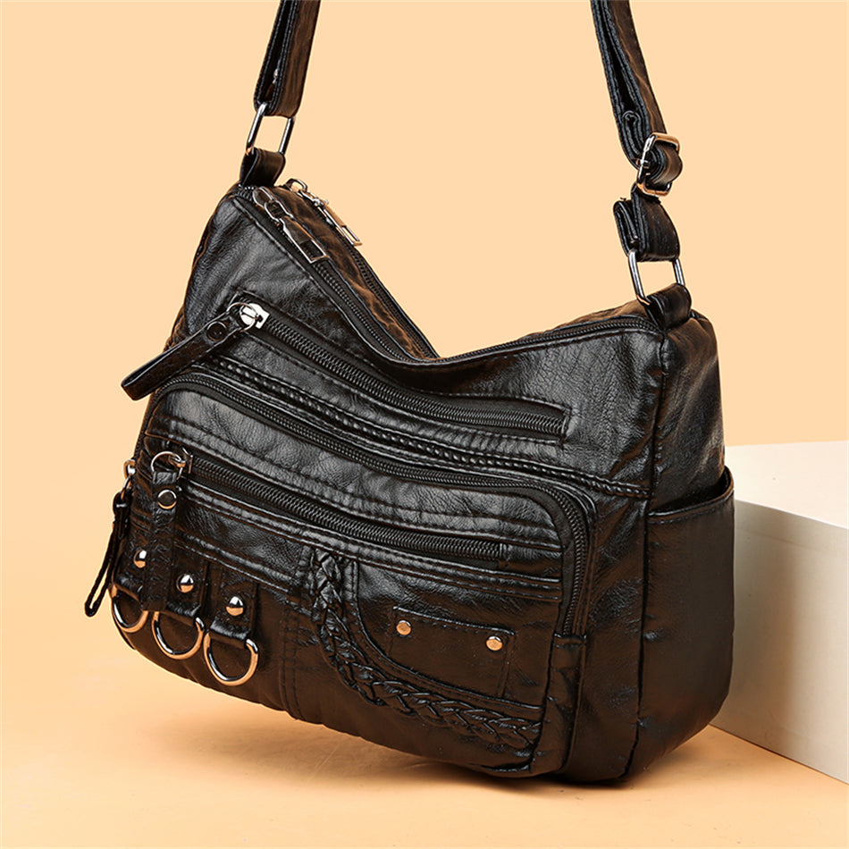 Sac femme noir élégant, style intemporel et polyvalent, accessoire de mode pour toutes saisons.