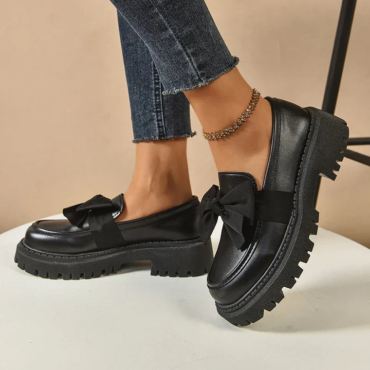 Semelle compensée Garisa, chaussures plateforme. Nœud papillon pour un style femme mode et chic.
