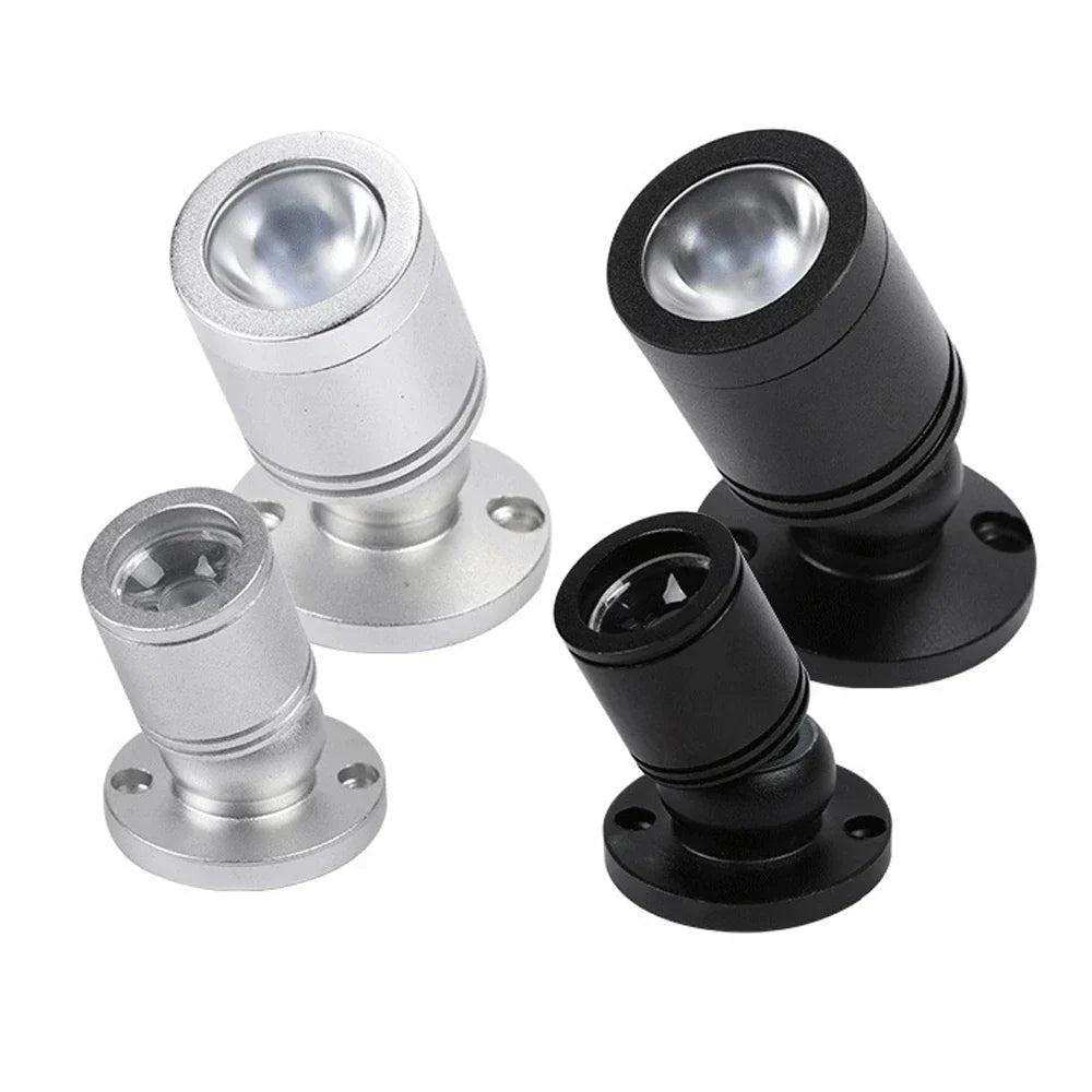 Mini spot LED USB orientable en aluminium pour éclairage de vitrine ou décoration intérieure, lumière ciblée.