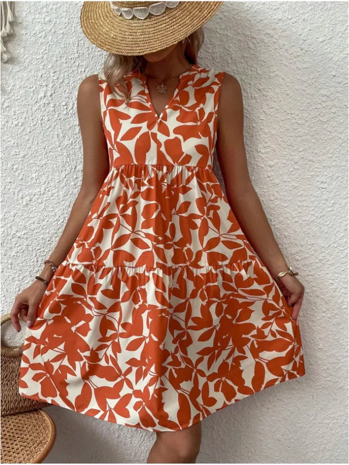 Robe courte noire sans manches femme, intemporelle et chic. Idéale pour toute occasion estivale ou printanière.
