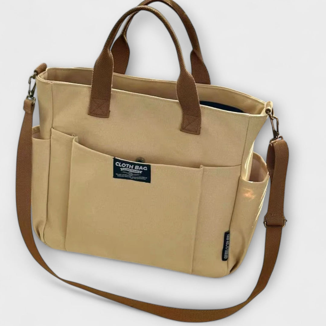 Sac fourre-tout femme élégant en toile minimaliste, parfait pour le quotidien.