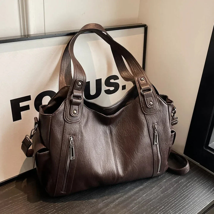 Sac à main Aliona noir, élégance et fonctionnalité pour femme, parfait pour le travail et l'école.