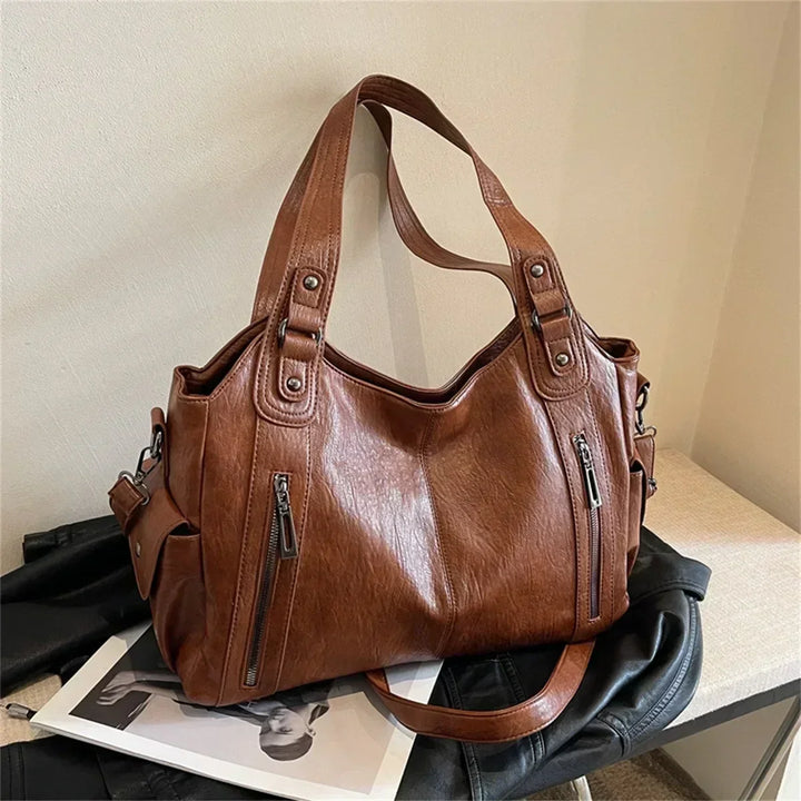 Sac à bandoulière femme Aliona, marron, maroquinerie élégante et robuste pour le travail.