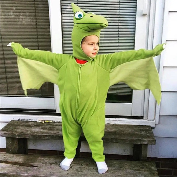 Costume enfant dinosaure Ptérosaure détaillé avec ailes. Parfait pour fêtes, déguisements ou cosplay.