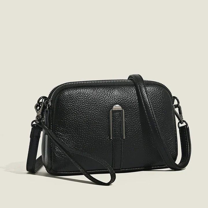Sac bandoulière chic femme, style luxe et organisation optimale. Compagnon élégant pour vos essentiels quotidiens.