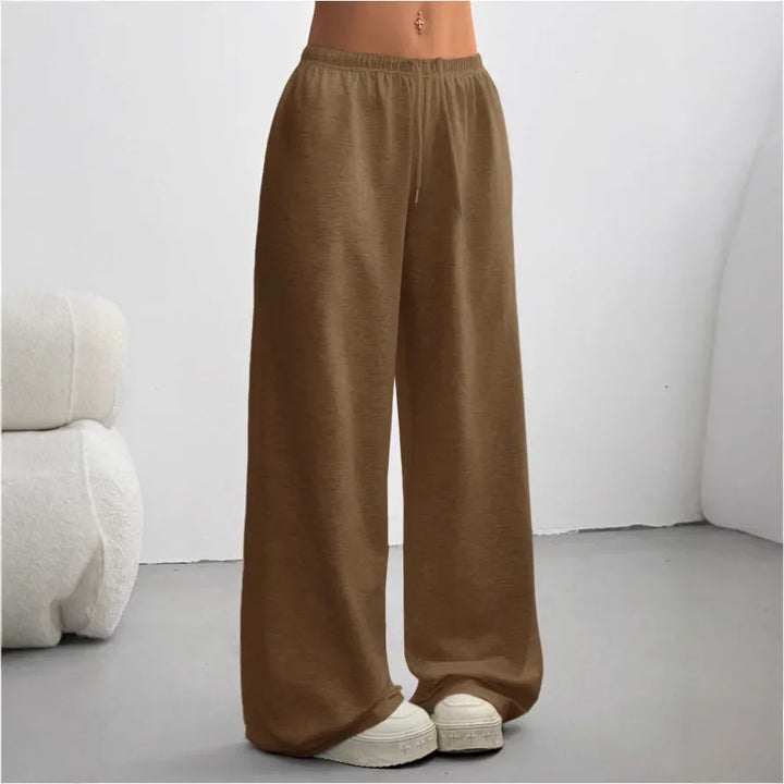 Pantalon jogging femme à jambes larges, confortable et décontracté, idéal pour le loungewear ou un style urbain.
