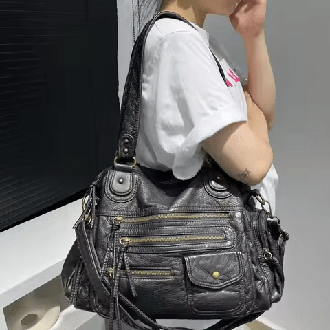 Élégant sac à main vintage pour femmes en simili cuir marron, avec multiples compartiments pratiques.