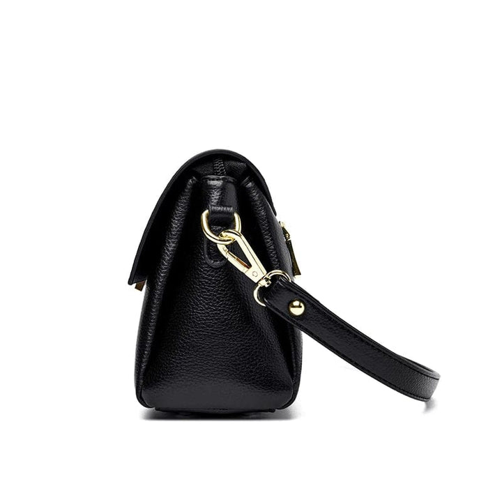 Sac bandoulière besace femme en cuir PU rouge, accessoire de mode vibrant. Idéal pour égayer une tenue.