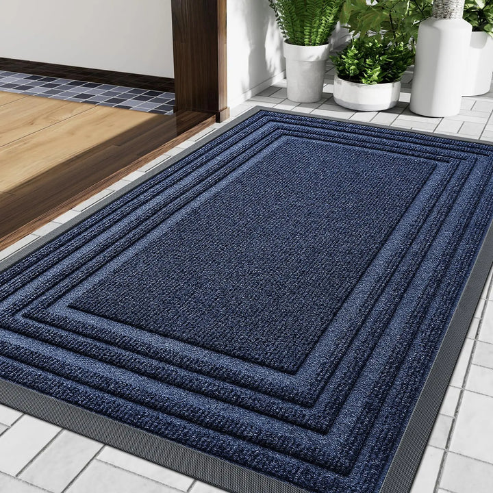Tapis de porte en caoutchouc noir, antidérapant, pour un accueil sécurisé. Adapté intérieur/extérieur, robuste.