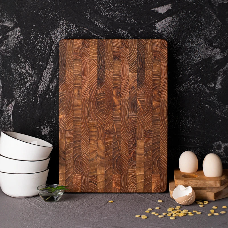 Planche à découper en teck élégante, ustensile de cuisine durable et décoration raffinée pour la maison.