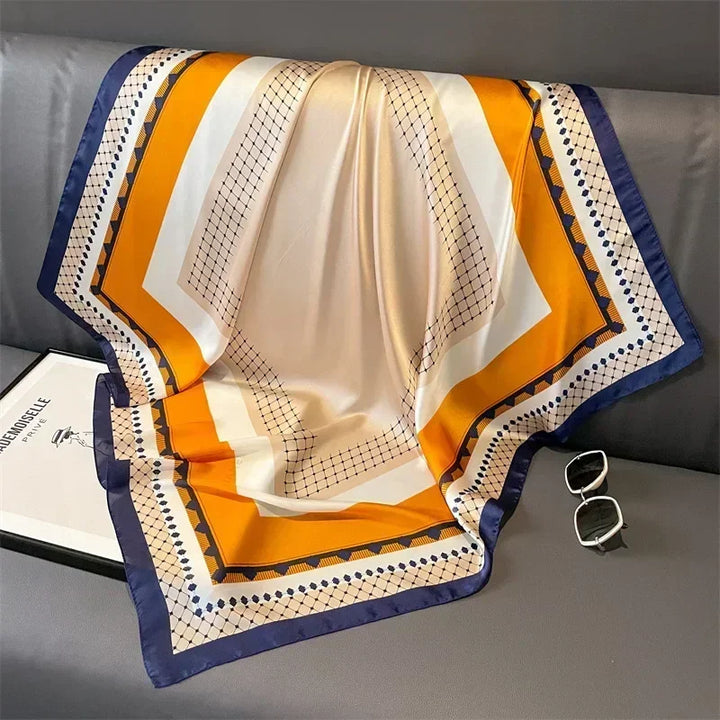 Foulard femme en satin imprimé, apporte une touche chic aux cheveux et aux sacs.