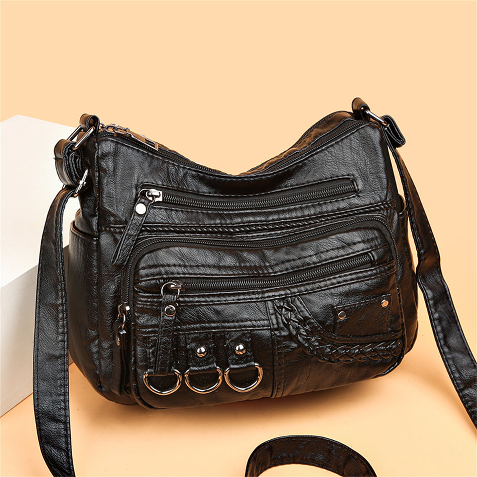 Sac à main femme vintage noir, accessoire chic et élégant, parfait pour le quotidien.