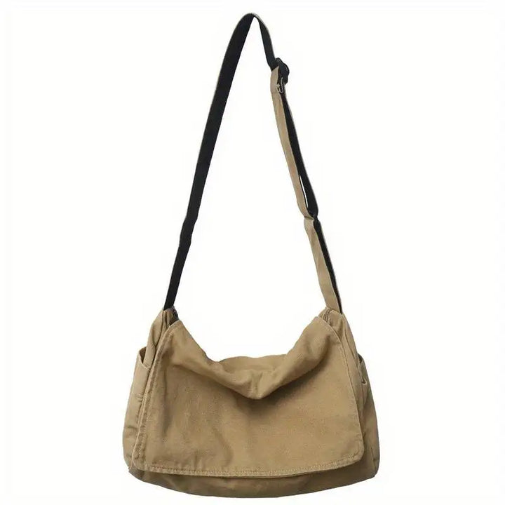 Sac bandoulière unisexe en tissu recyclé vert, vue de profil. Conception écoresponsable, léger et résistant.