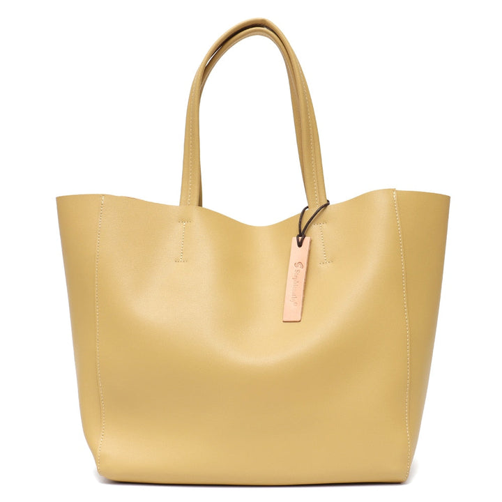 Fermeture zippée du sac à main cabas en cuir, sécurité et praticité pour vos affaires féminines.