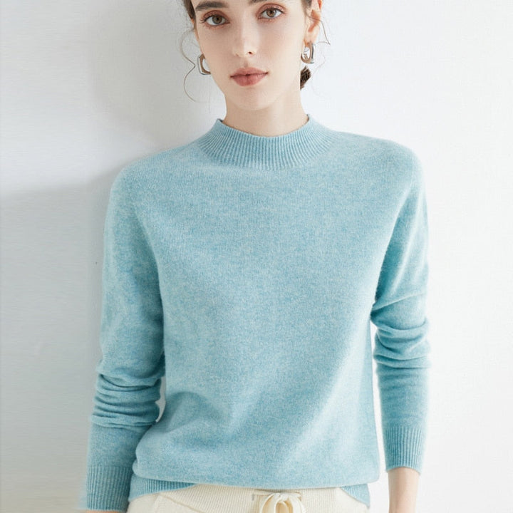 Vêtement femme chic: pull PARIS en cachemire, manches longues, coupe élégante et confort ultime au quotidien.