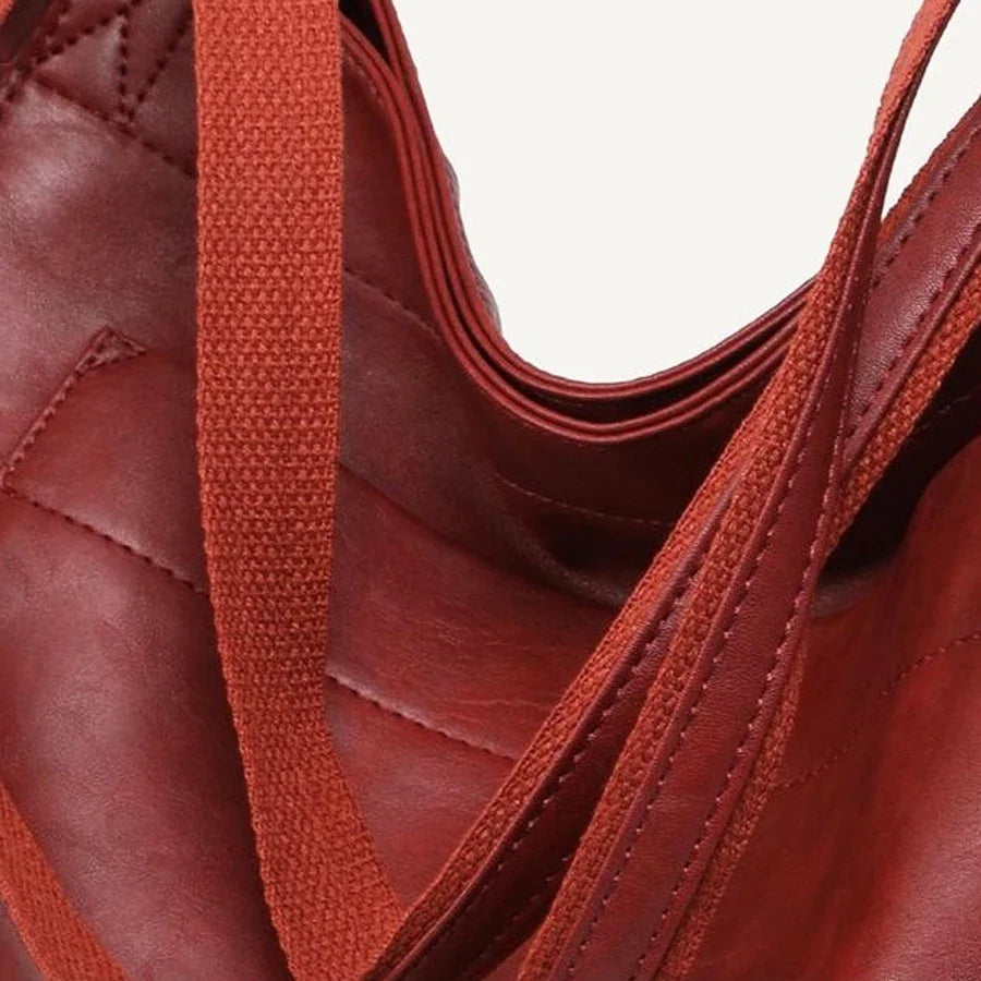 Sac cabas femme grand format en simili cuir PU. Design intemporel, parfait pour un usage quotidien.